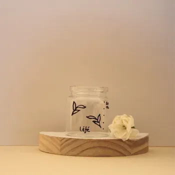 Doseur de liquide lessive naturel en verre illustré